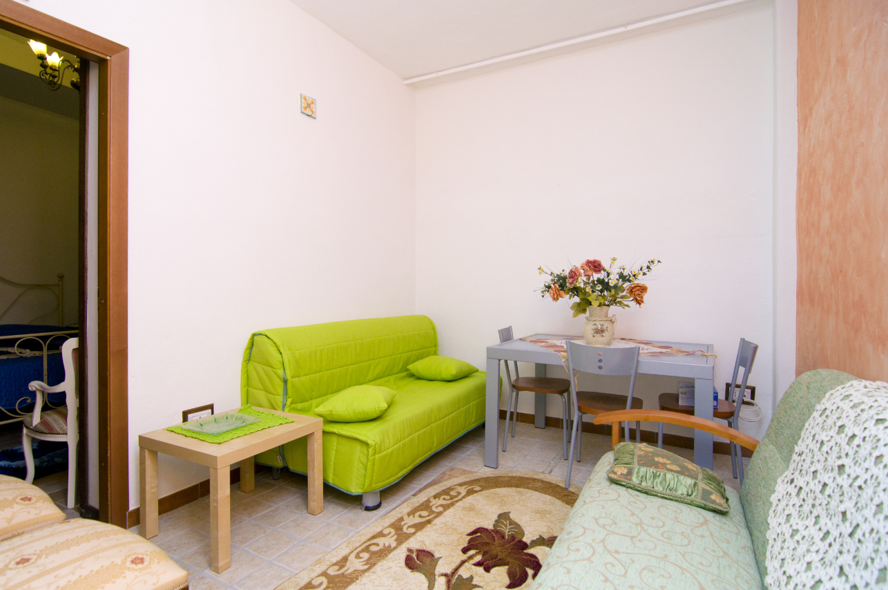 Soggiorno con divano letto Nausicaa - Casa Vacanze Cilento